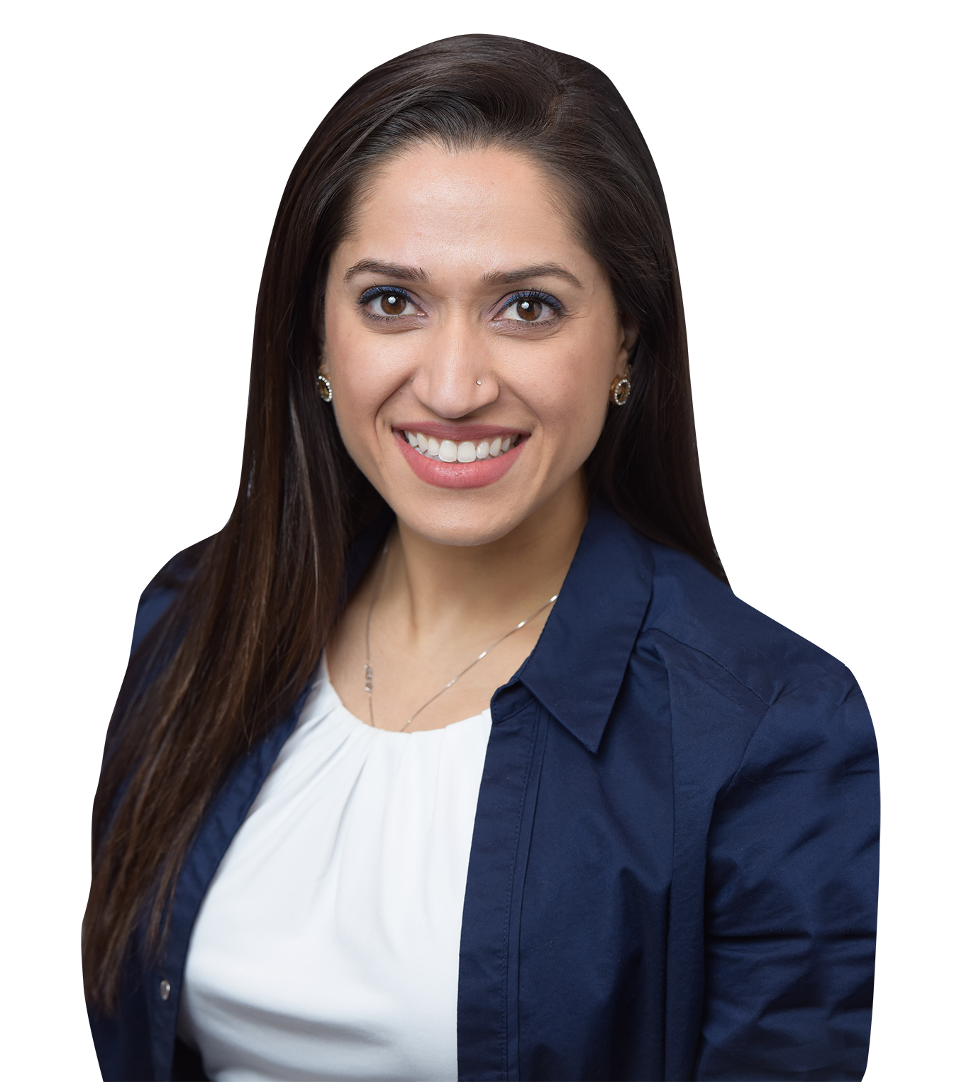 Portrait of Dr. Tanvi Arora Bakshi, smiling with dark hair, wearing a navy blue blazer and white top.